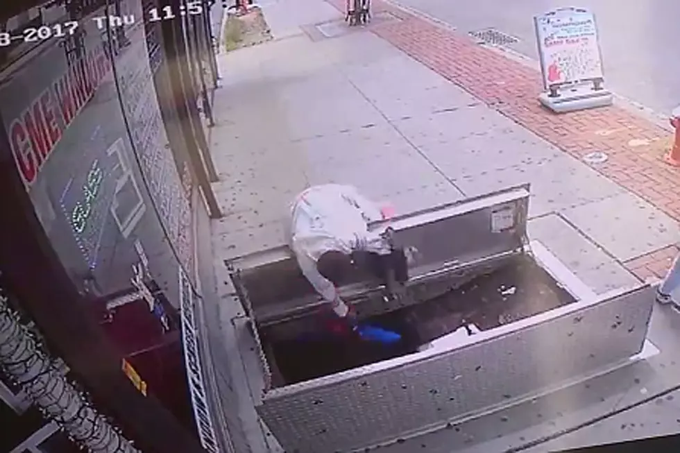 Distracted Texting Woman Plunges 6 Feet Down Open Sidewalk Door