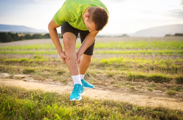 Runner with injured calf